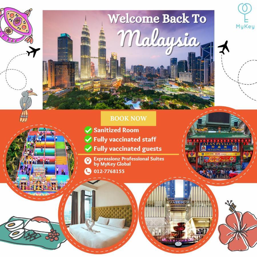 Expressionz Professional Suites By Mykey Kuala Lumpur Kültér fotó A poster advertising the reopening of Malaysia's borders to tourists.